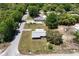 Aerial view of the property, showcasing its location and surrounding landscape at 30011 County Road 437, Sorrento, FL 32776
