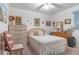 Cozy bedroom with ceiling fan, decorative accents, and soft lighting at 3075 Cr 431N, Lake Panasoffkee, FL 33538