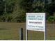 Debbie Little Community Park sign for residents and accompanied guests only, maintained by Regal Trials Property Owners Association at 31728 Nutmeg Ave, Eustis, FL 32736