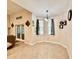 Bright dining area with tiled floors, natural light, and neutral wall colors at 31728 Nutmeg Ave, Eustis, FL 32736