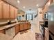Well-lit kitchen with stainless steel appliances and stylish countertops at 31728 Nutmeg Ave, Eustis, FL 32736
