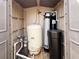 Water treatment equipment inside of small shed with open double doors at 31728 Nutmeg Ave, Eustis, FL 32736