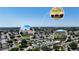 Aerial shot showing proximity to local shopping and community pool at this home located at 3294 Shelby St at 3294 Shelby St, The Villages, FL 32162