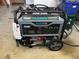 Pulsar 12,000W dual fuel generator with electric push start and multiple power outlets for various appliances at 3294 Shelby St, The Villages, FL 32162
