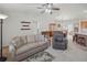 Open-concept living room flows into dining area and kitchen at 3294 Shelby St, The Villages, FL 32162