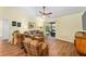 Open living space with plenty of natural light and neutral decor at 3396 Greenacres Ter, The Villages, FL 32163