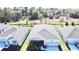 Aerial view of a well-maintained single-story home with fenced backyard, offering privacy and space at 34004 Sky Blossom Cir, Leesburg, FL 34788