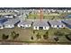 An aerial view of the property showing the backyard and neighborhood at 34004 Sky Blossom Cir, Leesburg, FL 34788