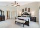 Bright bedroom with decor and furnishings at 3723 Belle Rose Dr, Leesburg, FL 34748