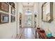 Elegant foyer with decorative tile flooring and arched doorways offering a glimpse into the living spaces at 3723 Belle Rose Dr, Leesburg, FL 34748