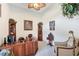 Cozy office space with decor and ample room for work or study at 3723 Belle Rose Dr, Leesburg, FL 34748