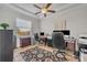 Comfortable office space with a ceiling fan, and bright window at 4060 Longbow Dr, Clermont, FL 34711