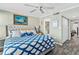 Comfortable bedroom with ensuite bathroom and closet at 4841 Saxon Dr # E206, New Smyrna Beach, FL 32169