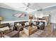 Spacious living room that opens to kitchen and dining areas at 4841 Saxon Dr # E206, New Smyrna Beach, FL 32169