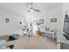 Bedroom setup as an office with a fan, a window and furniture for studying at 4972 Big Cypress St, Oxford, FL 34484