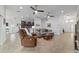 Inviting living room with an open layout, tile flooring, and plenty of natural light at 4972 Big Cypress St, Oxford, FL 34484