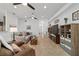 Spacious living room featuring an open layout, with tile floors, and plenty of natural light at 4972 Big Cypress St, Oxford, FL 34484