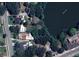 Bird's eye view showcases the home's location near Lake Lucerne at 504 S 12Th St, Leesburg, FL 34748