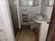 Small bathroom featuring a sink, toilet, and shower at 504 S 12Th St, Leesburg, FL 34748