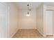 Cozy dining area with neutral tones and modern light fixture at 5340 Edgewater Way # 1, Oxford, FL 34484