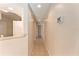 Hallway showing access to rooms with neutral color palette at 5340 Edgewater Way # 1, Oxford, FL 34484