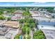 Aerial view of downtown historic district featuring brick-paved streets, mature trees, shops and local businesses at 644 Orange Belt Loop, Winter Garden, FL 34787
