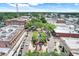 Aerial view of brick street with a fountain, benches, and historic buildings with the downtown skyline at 644 Orange Belt Loop, Winter Garden, FL 34787