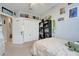 Bedroom features a ceiling fan, closet, Star Wars decorations, and neutral colored walls at 644 Orange Belt Loop, Winter Garden, FL 34787