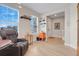 Comfortable living area with large window, great natural light, and open floor plan design at 644 Orange Belt Loop, Winter Garden, FL 34787