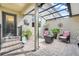 This home has a screened patio with brick pavers and comfortable outdoor seating at 644 Orange Belt Loop, Winter Garden, FL 34787