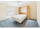 Comfortable bedroom featuring a built-in Murphy bed, offering convenience and space-saving functionality at 715 Megan Circle, The Villages, FL 32159