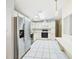 Functional kitchen with tiled floor and stainless steel appliances, perfect for cooking at 715 Megan Circle, The Villages, FL 32159
