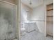 A full bathroom with single vanity and shower/tub combination needs updating at 819 Hibiscus Dr, The Villages, FL 32159