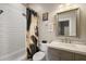 Neutral bathroom with white subway tile and white vanity at 848 Hawk Lndg, Fruitland Park, FL 34731