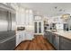 Modern kitchen with stainless steel appliances, granite counters and an island with sink at 848 Hawk Lndg, Fruitland Park, FL 34731