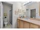 Bathroom with neutral countertops, tile flooring, and shower stall at 9325 Se 172Nd Garden St, The Villages, FL 32162