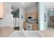 Kitchen with wood cabinets and white appliances at 9325 Se 172Nd Garden St, The Villages, FL 32162
