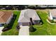 Lovely home with well-maintained landscaping, inviting curb appeal, and a private driveway at 9593 Se 124Th Loop, Summerfield, FL 34491