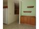 Dining area with built-in storage and access to the kitchen at 9593 Se 124Th Loop, Summerfield, FL 34491