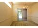 Cozy dining area with carpet and sliding glass doors to the lanai at 9593 Se 124Th Loop, Summerfield, FL 34491