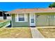Charming single-story home with a well-maintained lawn and neat landscaping at 10301 Us Highway 27 # 98, Clermont, FL 34711