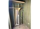 Interior view of the storage closet featuring plumbing, shelving, and household items at 10301 Us Highway 27 # 98, Clermont, FL 34711