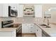 Modern kitchen featuring sleek appliances, stylish countertops, and ample storage in a well-designed space at 12129 Grand Oak Ln, Oxford, FL 34484