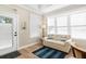 Comfortable living room with natural light, neutral tones, and stylish decor for a relaxing atmosphere at 12129 Grand Oak Ln, Oxford, FL 34484