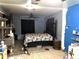 Bedroom with a colorful quilt and natural light at 1431 Ne 53Rd St, Ocala, FL 34479