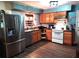 Functional kitchen with stainless steel refrigerator and a window at 1431 Ne 53Rd St, Ocala, FL 34479