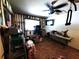 Room with exposed studs in the walls, a window for natural light, and a ceiling fan at 1431 Ne 53Rd St, Ocala, FL 34479