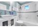 A nice bathroom with a tub and vanity sink at 16538 Rockwell Heights Ln, Clermont, FL 34711