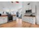 Bright kitchen with an open layout, stainless steel appliances, and plenty of counter space and storage at 16538 Rockwell Heights Ln, Clermont, FL 34711