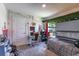 Youth bedroom with natural light and a modern desk and chair at 1922 Angel Fish Loop, Leesburg, FL 34748